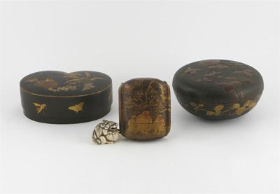 Appraisal: Two Japanese iron boxes and covers one decorated with chestnuts