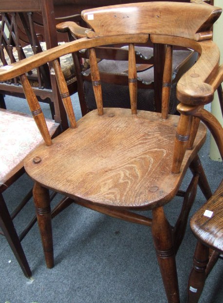 Appraisal: A late th century beech and ash smokers bow armchair