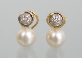 Appraisal: A Pair of k Gold Pearl and Diamond Cluster Earrings