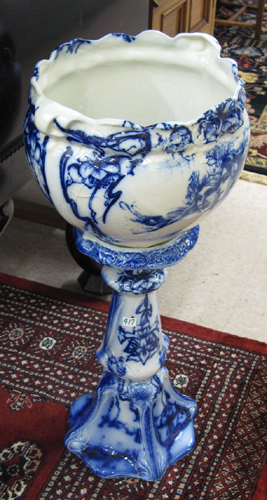 Appraisal: AN ART NOUVEAU STYLE FLOWING BLUE JARDINIERE AND STAND The