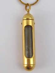 Appraisal: A yellow metal tests carat gold pendant and chain the