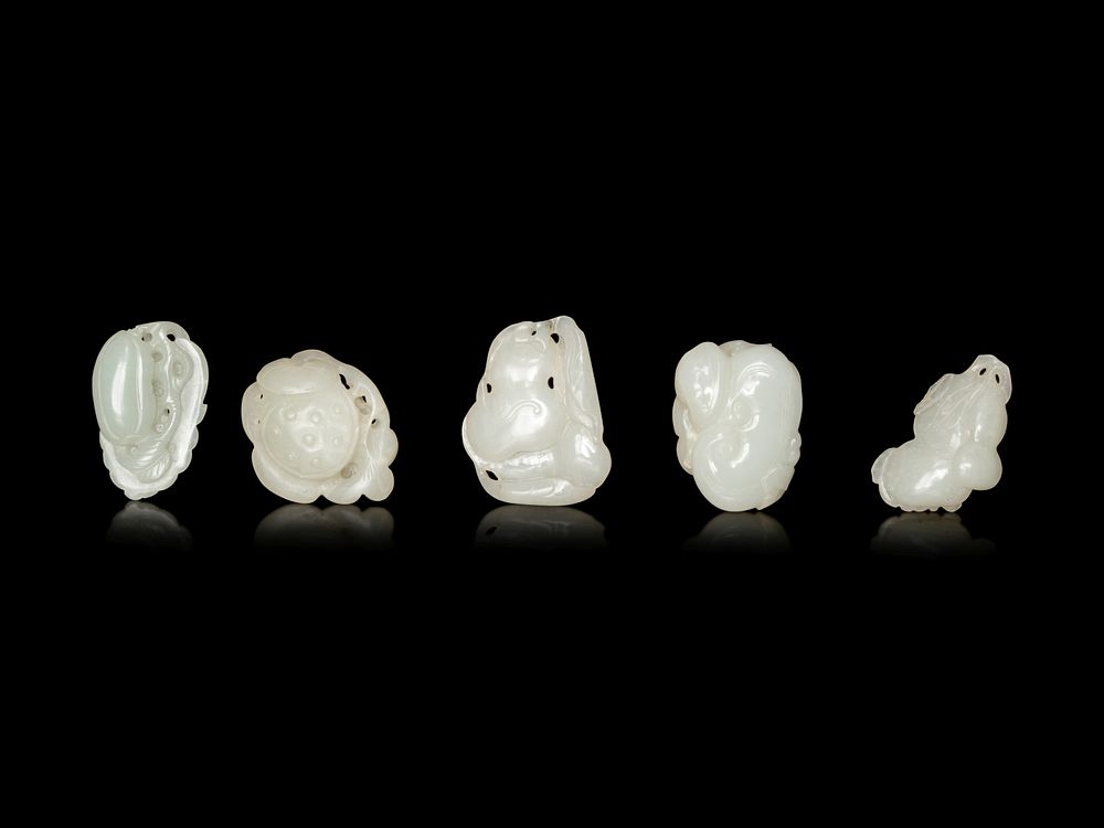 Appraisal: Five White Jade Carved Figures of Fruit Length of longest