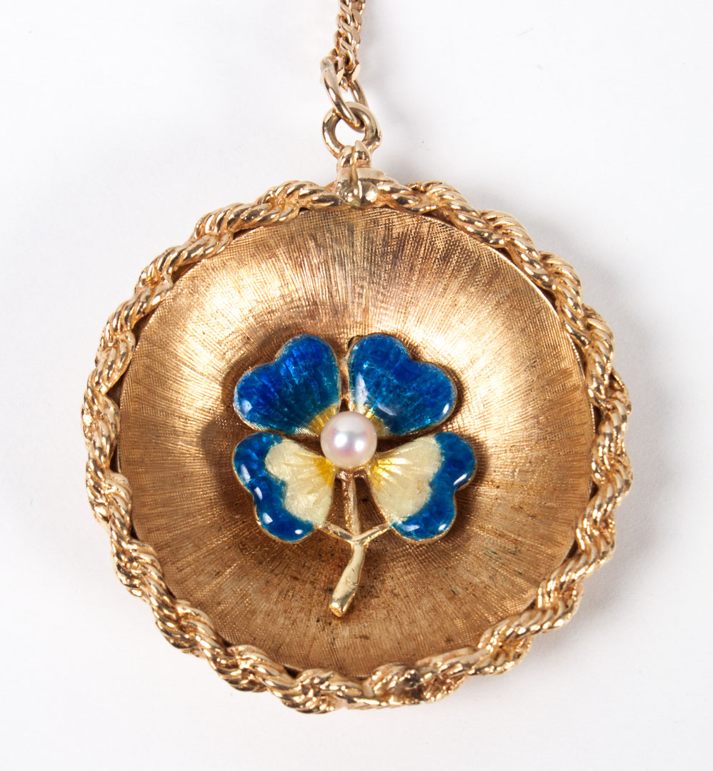 Appraisal: Lady's K gold round pendant with center enameled four-leaf clover