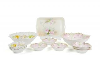 Appraisal: TWO CONTINENTAL PORCELAIN STRAWBERRY SERVICES Early th century Comprised of