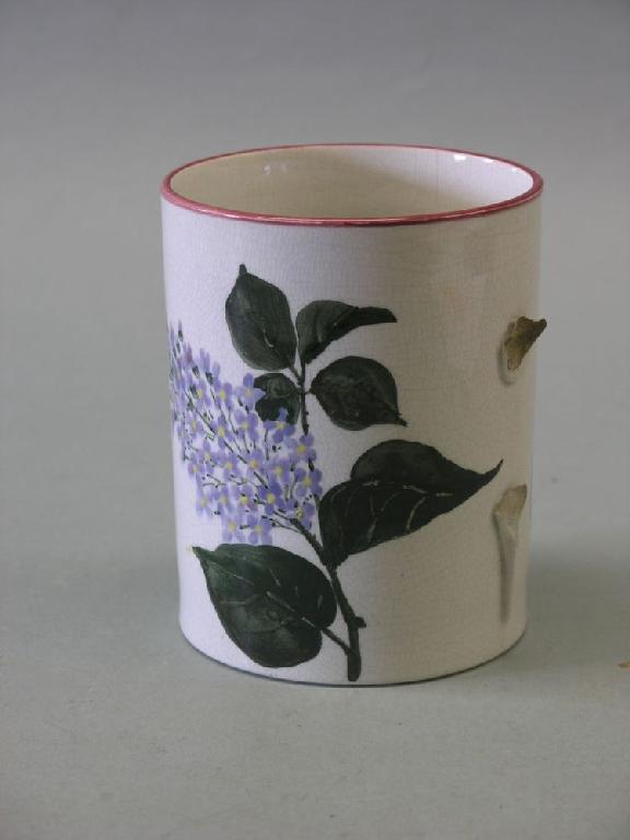 Appraisal: A damaged Wemyss mug cylindrical shape painted with flowers in