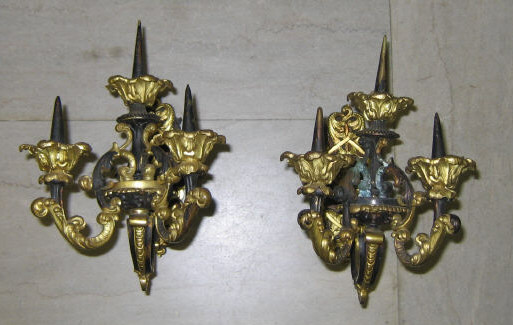 Appraisal: PAIR OF GILT BRONZE WALL SCONCES Foliate wall plates issuing