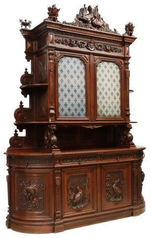 Appraisal: Monumental French oak hunt cupboard late th c carved crest