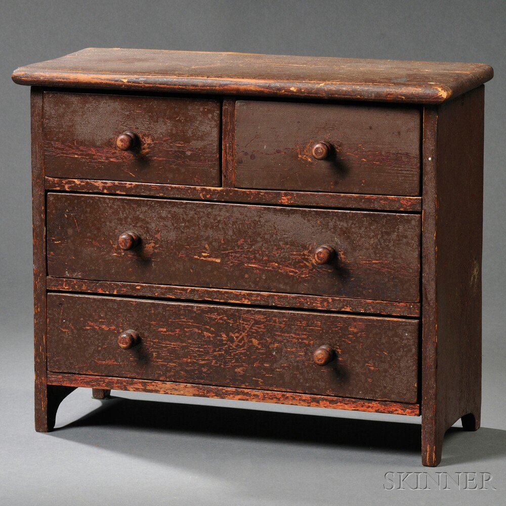 Appraisal: Miniature Red-painted Pine Bureau America th century thumb-molded overhanging top