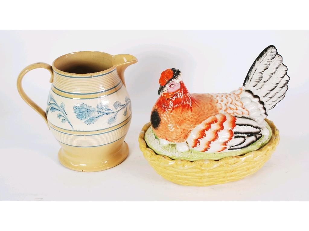 Appraisal: NINETEENTH CENTURY LARGE STAFFORDSHIRE 'HEN ON NEST' POTTERY DISH AND