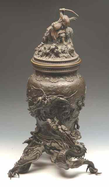 Appraisal: A JAPANESE NATURALISTIC LARGE BRONZE VASE and cover with samurai