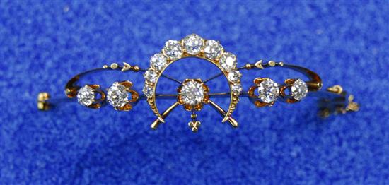 Appraisal: YELLOW GOLD AND DIAMOND BANGLE BRACELET set with round cut