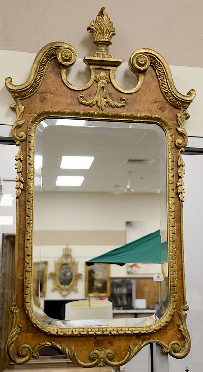 Appraisal: George II style giltwood and walnut mirror surmounted by a