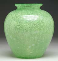 Appraisal: STEUBEN CLUTHRA VASE Urn shaped vase with lime green colored