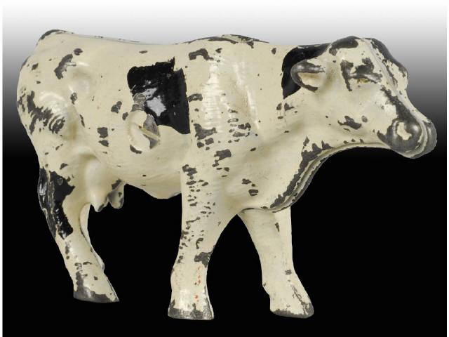 Appraisal: Cast Iron Holstein Cow Still Bank Description Made by Arcade