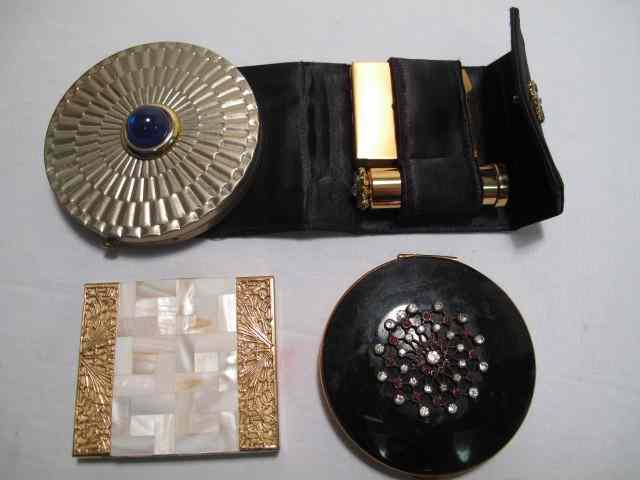 Appraisal: Lot of four assorted vintage ladies compacts Includes enamel silver-toned