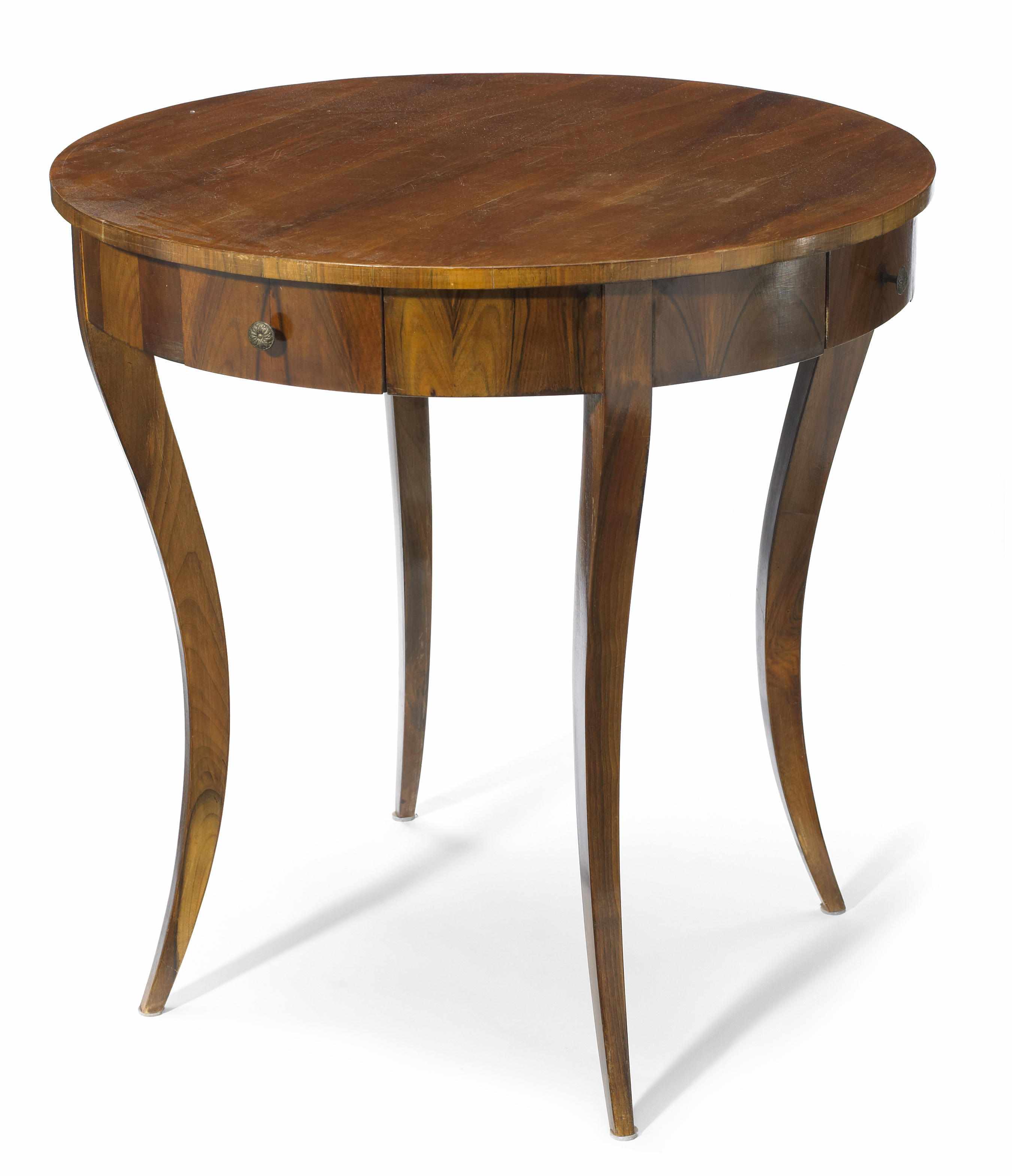 Appraisal: A Biedermeier style walnut center table height in cm diameter