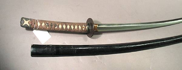 Appraisal: A Japanese katana The inch signed blade showing strong temper