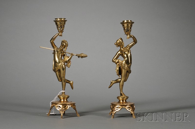 Appraisal: Pair of Bronze Neoclassical-style Figural Candlesticks th century formed as