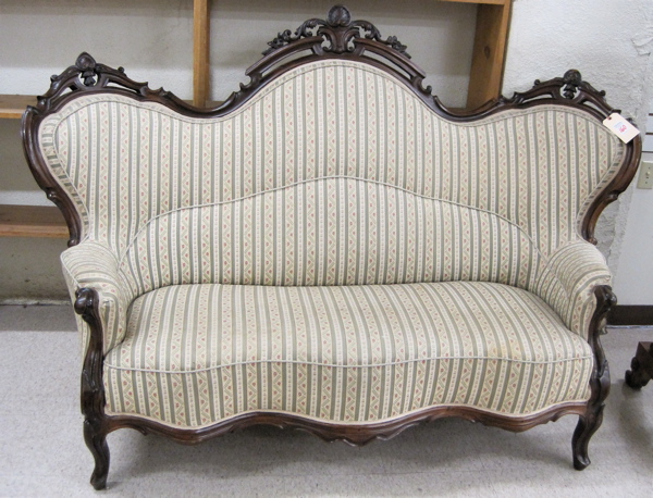 Appraisal: VICTORIAN TRIPLE-ARCH SOFA Rococo Revival design American c having a