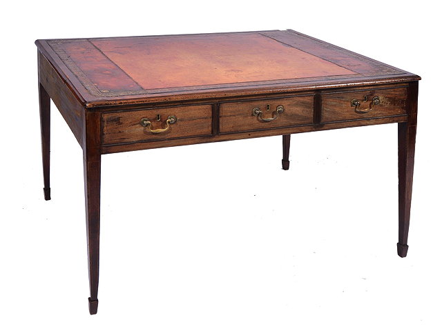 Appraisal: A GEORGIAN STYLE MAHOGANY RECTANGULAR LIBRARY TABLE fitted three drawers