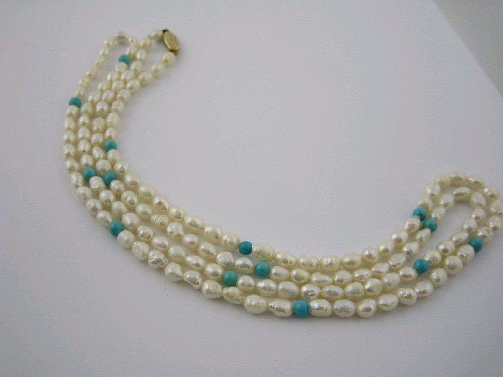 Appraisal: A single row of Freshwater Pearls with turquoise bead spacers