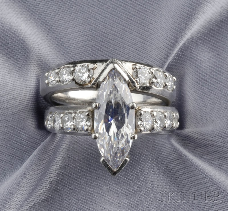 Appraisal: Platinum and Diamond Solitaire Scott Kay set with a marquise-cut