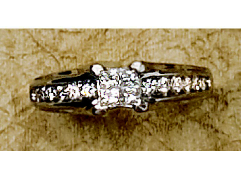 Appraisal: DIAMOND RING k white gold ring set with four invisible