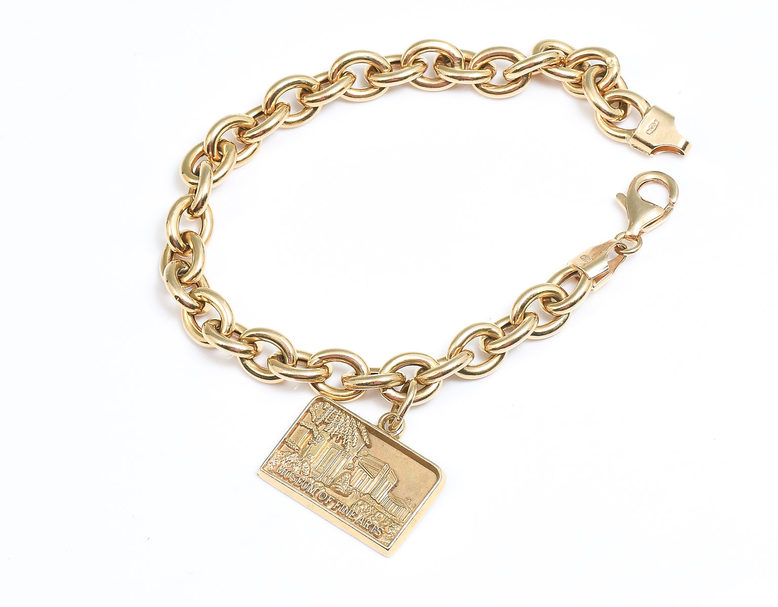 Appraisal: K CHARM BRACELET WITH MFA CHARM '' long charm bracelet