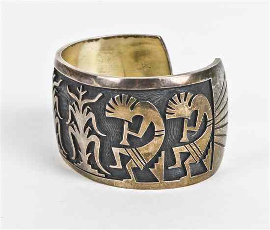 Appraisal: A Hopi Style Sterling Silver Overlay Cuff Bracelet depicting Kokopelli