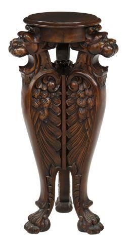 Appraisal: Carved mahogany pedestal plant stand th c with three winged