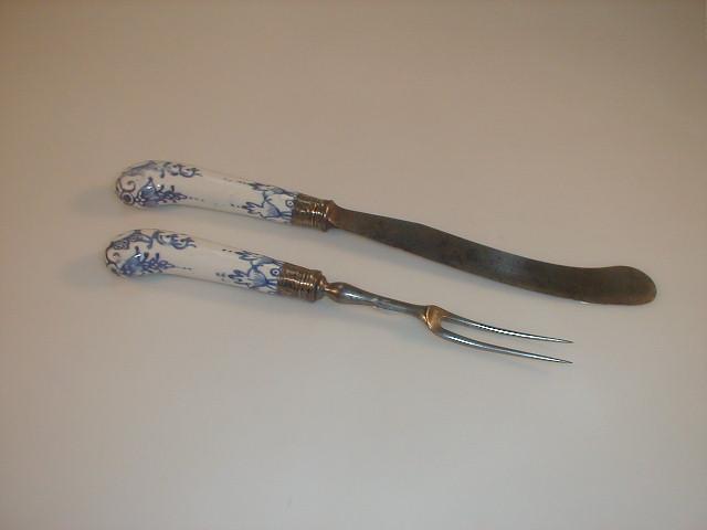 Appraisal: A pair of steel game servers with blue tin glaze