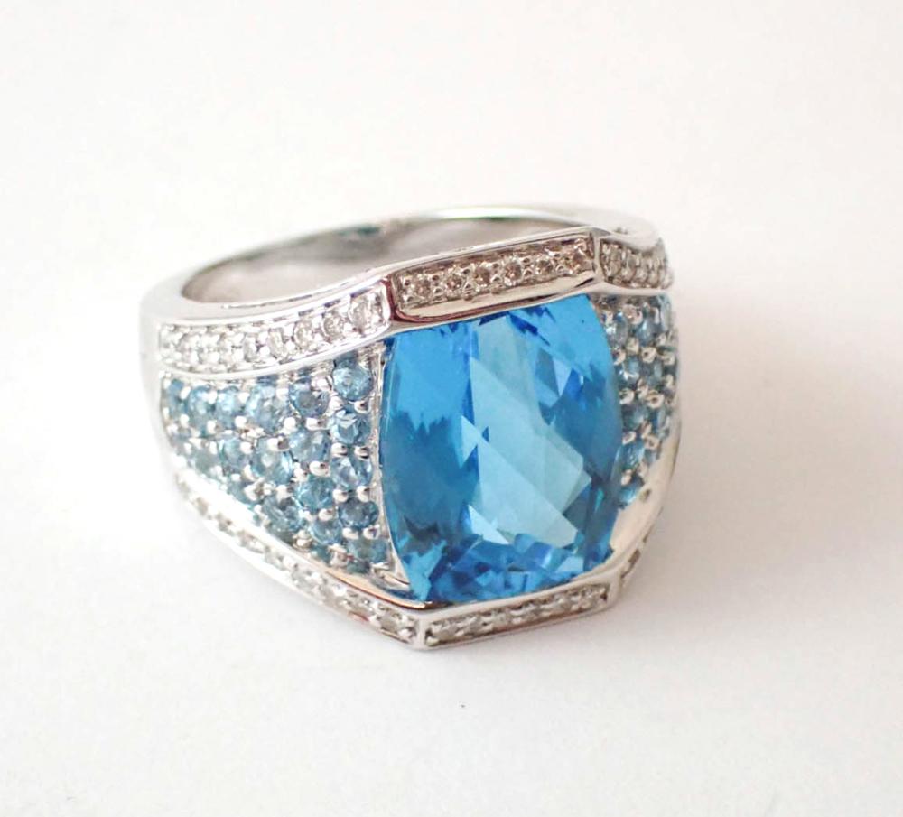 Appraisal: BLUE TOPAZ DIAMOND AND FOURTEEN KARAT GOLD RING The k