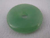 Appraisal: A jade disc pendant approx cm diameter gms