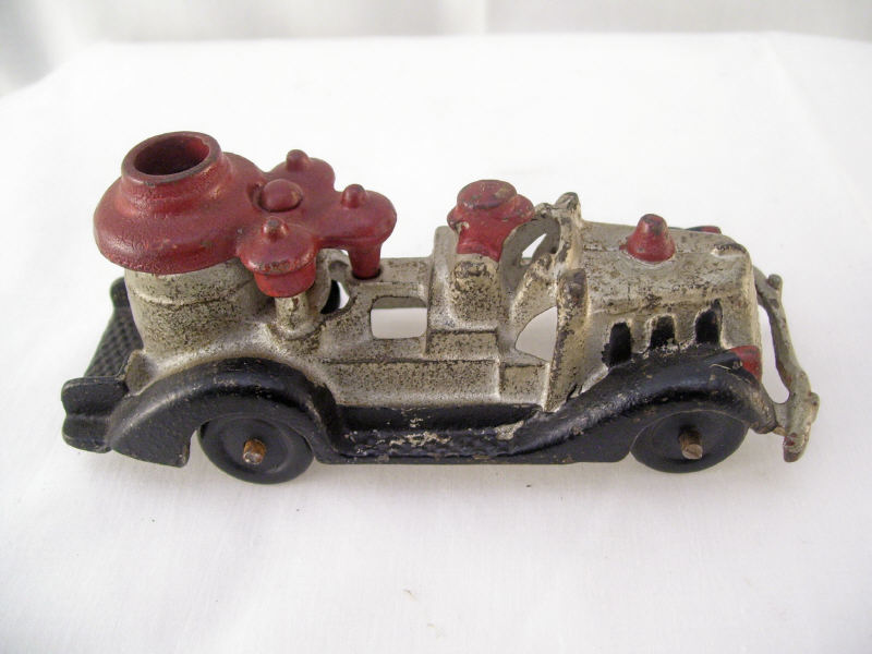 Appraisal: Cast Iron Hubley Fire Pumper Red black and silver paint