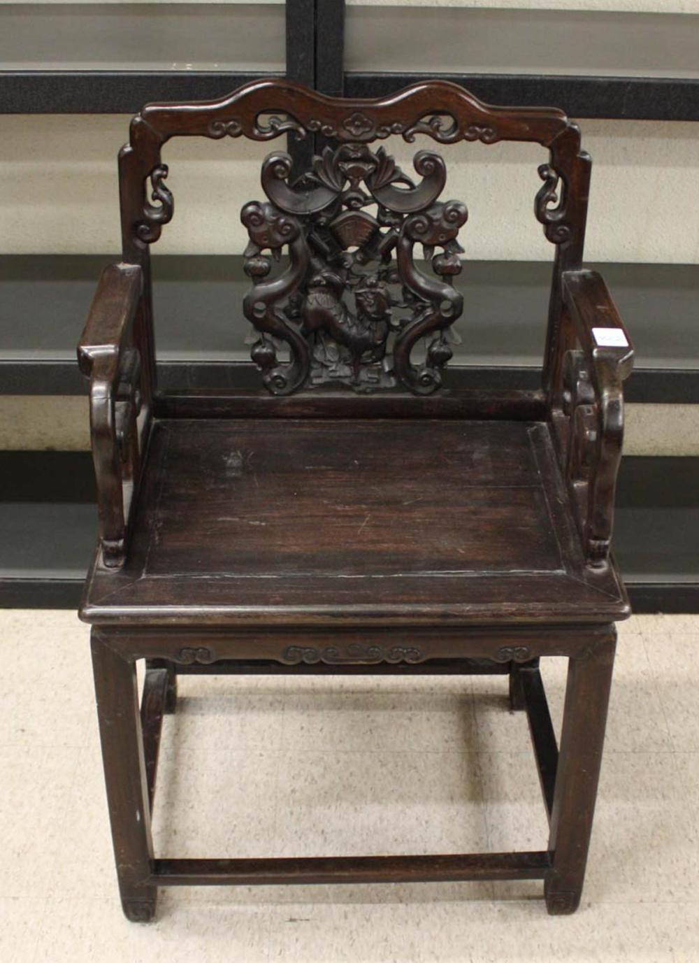 Appraisal: CHINESE CARVED HONGMU ARMCHAIR Qing Dynasty style early th century