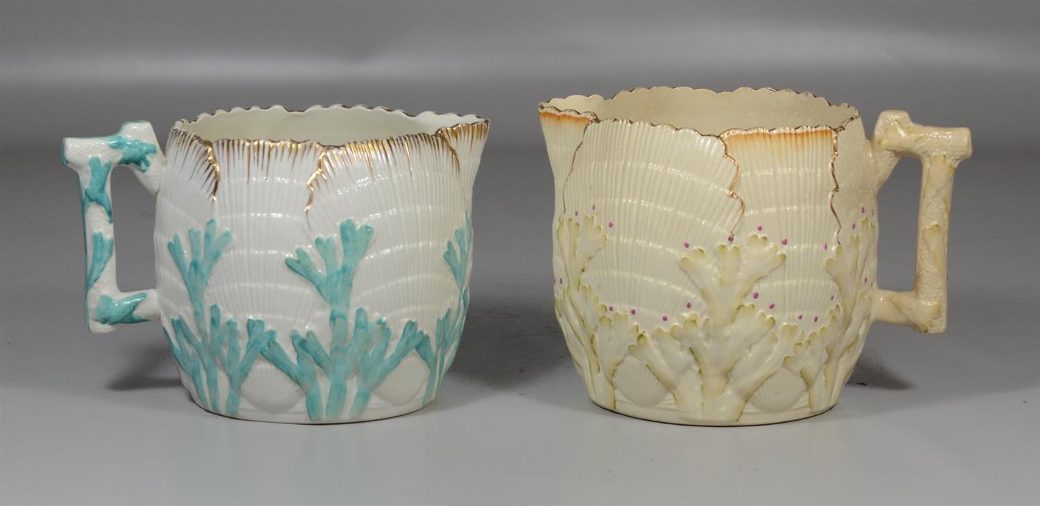 Appraisal: Shell and seaweed Majolica pitchers one marked Etruscan to base