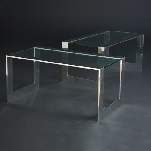 Appraisal: KARL SPRINGER Pair of U-shaped end tables with open sides