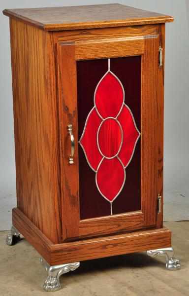 Appraisal: Oak Slot Machine Stand Description Red stained glass front Condition