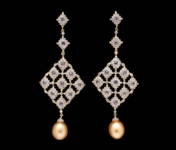 Appraisal: A pair of cultured pearl colored diamond and diamond earrings