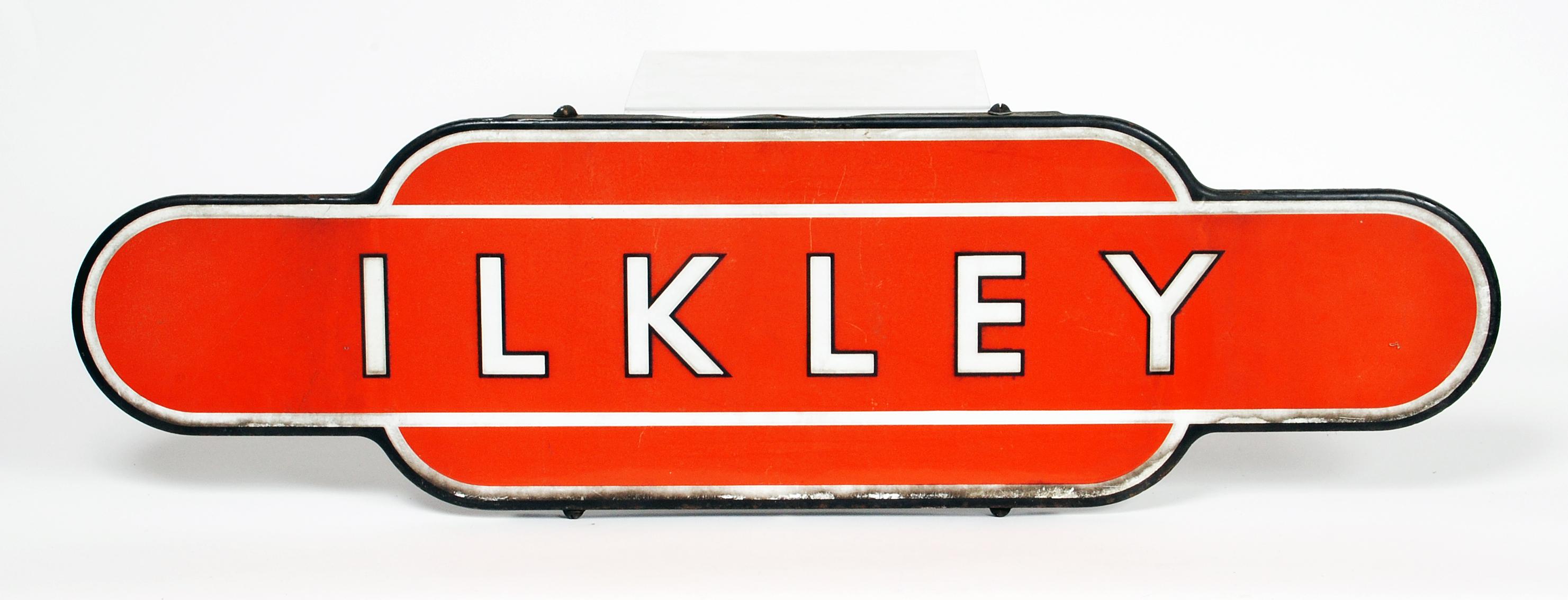 Appraisal: An enamelled tin totem station sign ILKLEY in white on