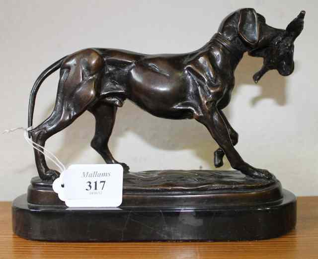 Appraisal: A BRONZE MODEL OF A RETRIEVER with pheasant unsigned but