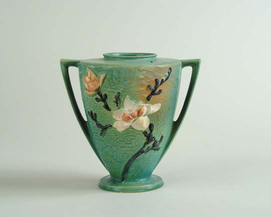 Appraisal: ROSEVILLE MAGNOLIA HANDLED VASE Shape No Roseville mark in relief