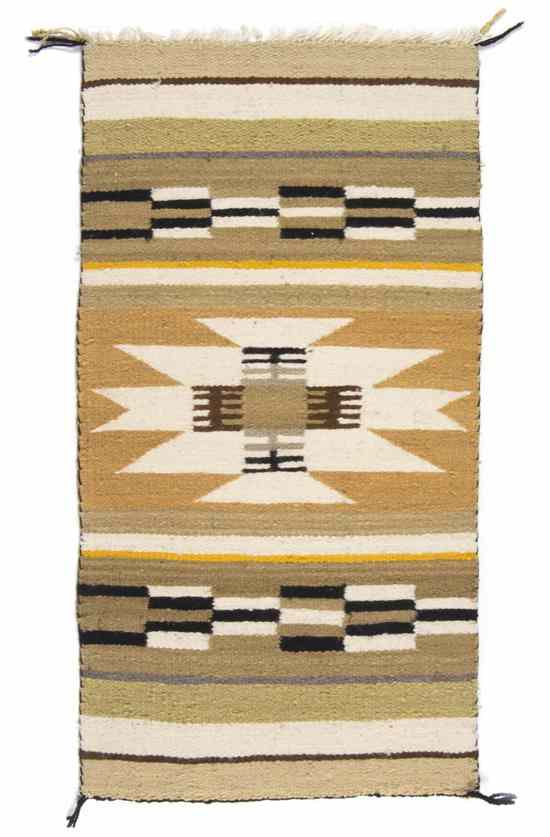 Appraisal: A Navajo Weaving Gallop Throw banded design with a star