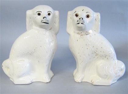 Appraisal: Pair of Staffordshire figures of spaniels th century Modeled seated