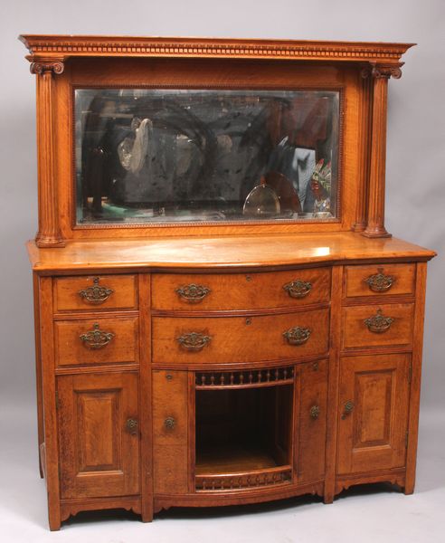 Appraisal: Oak Buffet w mirror and carved columns h x w