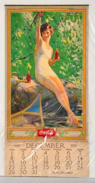 Appraisal: Coca-Cola Calendar Complete with original metal strip and full page