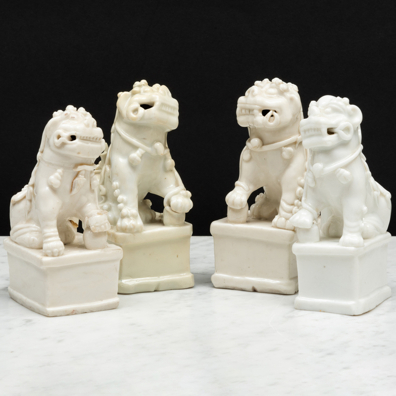 Appraisal: Group of Four Blanc de Chine Porcelain Buddhistic Lion Joss