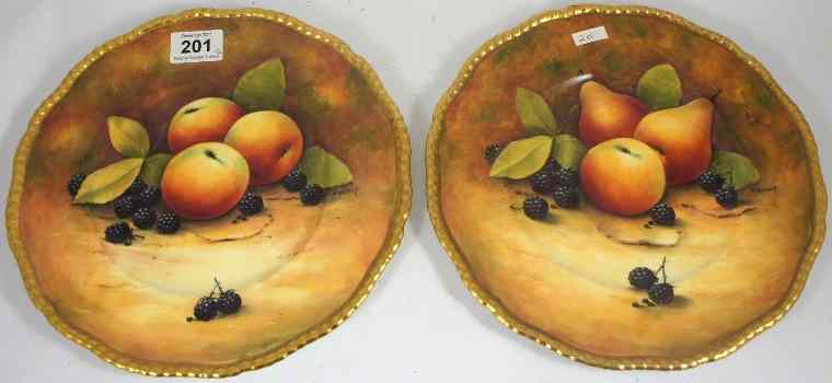 Appraisal: Pair of Coalport Plates decorated with Fruit by M Harnett