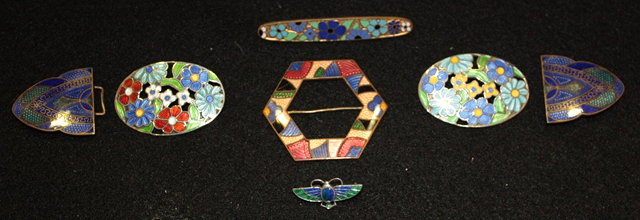 Appraisal: TWO SILVER BROOCHES of oval form with polychrome enamel floral