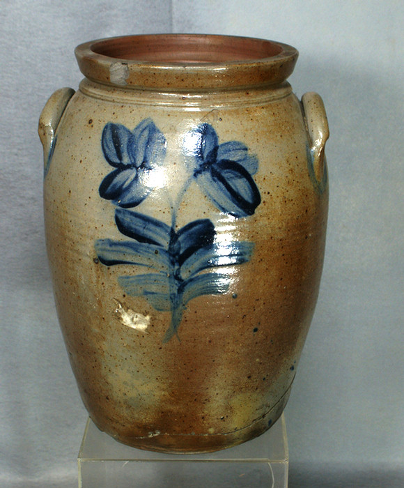 Appraisal: gallon stoneware jar with blue floral decoration large chip in